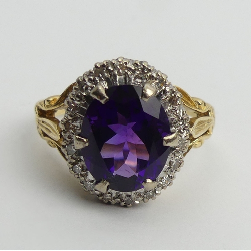 39 - 18ct gold amethyst and diamond ring, 7.6 grams, 16mm, size O1/2.