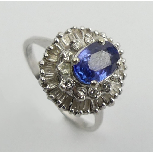 41 - 14ct white gold sapphire and diamond ring, 3.9 grams, 13mm, size L1/2.