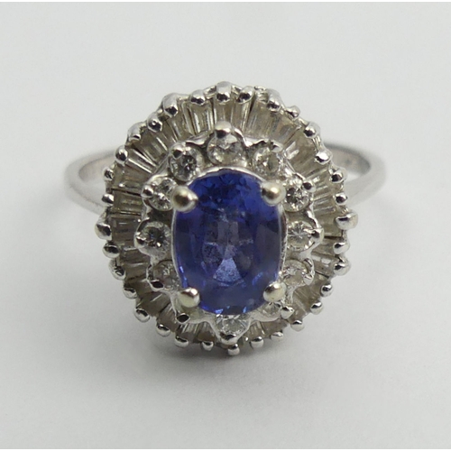 41 - 14ct white gold sapphire and diamond ring, 3.9 grams, 13mm, size L1/2.