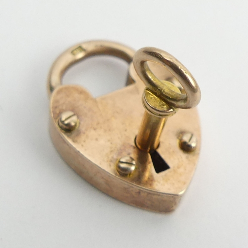 45 - 9ct rose gold padlock and key, 4.5 grams, 21.2 x 14.6mm.