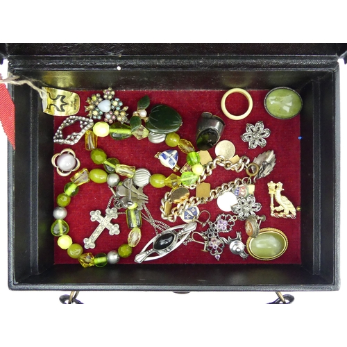 46 - An old jewellery box and contents including a Victorian enamelled locket pendant and chain.