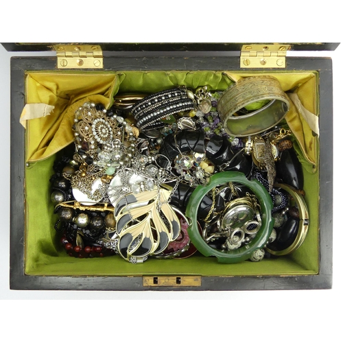 47 - A Victorian walnut jewellery box and contents including a silver hinged bangle.