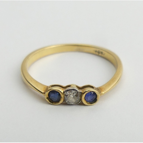 48 - 18ct gold sapphire and diamond three stone ring, 2.1 grams, 2.9mm, size P.
