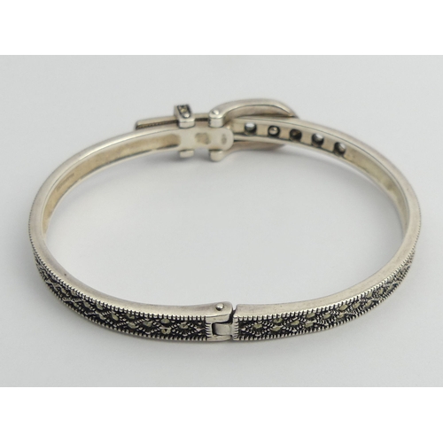 55 - Sterling silver hinged belt and buckle design bangle set with marcasite, 24.5 grams, 11.2mm widest p... 