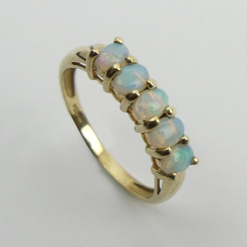 59 - 9ct gold five stone opal ring, 1.8 grams, 4mm, size O.