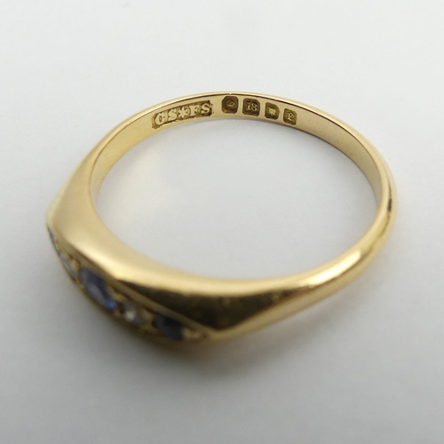 60 - George V 18ct gold sapphire and diamond ring, London 1920, 3.1 grams, 4mm, size M.