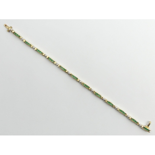 62 - 9ct gold (tested) emerald and diamond line bracelet, 9.8 grams, 18cm x 3mm.