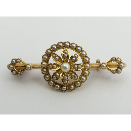 66 - 15ct gold seed pearl brooch, 5.2 grams, 41 x 16.5mm.