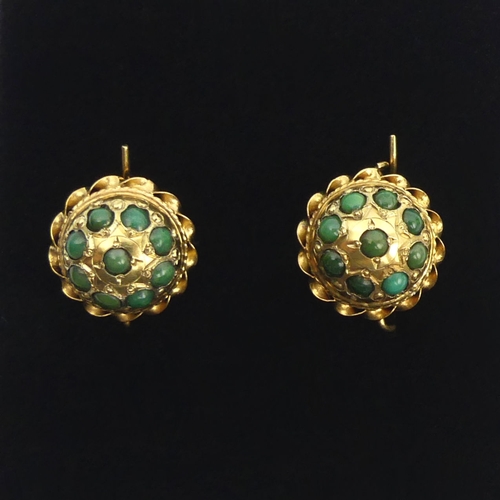 74 - A pair of 15ct gold turquoise set earrings, 4.3 grams, 13mm in diameter.