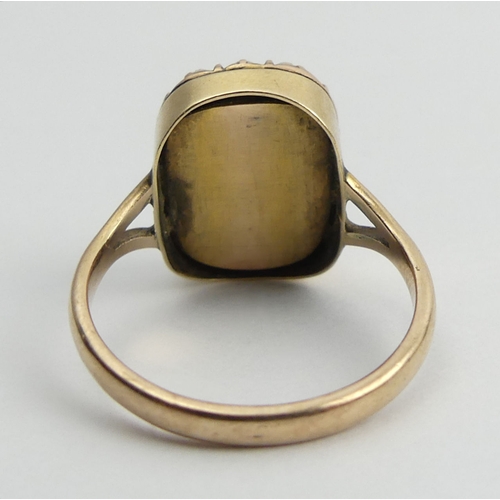 80 - Gold mourning ring set with split pearls, 3.5 grams, 15mm, size O.