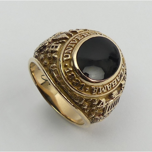 82 - 10ct gold onyx set Alabama University ring, 15.9 grams, 20mm, size R.