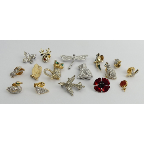 83 - A box containing 16 Swarovski and other crystal pins and brooches.