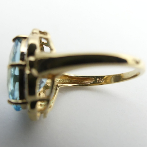 89 - 9ct gold blue topaz and diamond ring, 4.4 grams, 17.4mm, size K 1/2.