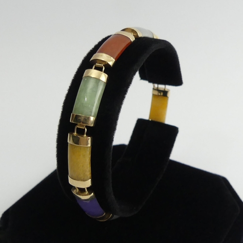 95 - 9ct gold multi-coloured jade set bracelet, 10.6 grams, 17cn x 7.3mm.