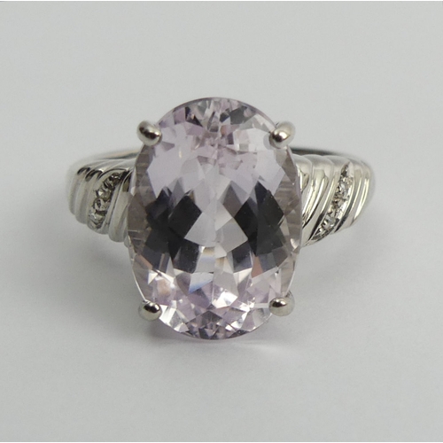 101 - 9ct white gold amethyst and diamond ring 5.2 grams, 14mm, size N1/2.