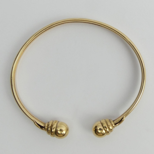 103 - 9ct gold torque bangle, 6.8 grams.