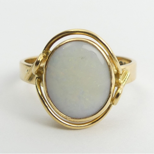 104 - 18ct gold opal ring, 4.4 grams, 15mm, size O1/2.