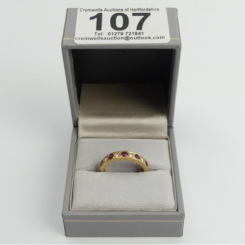 107 - 18ct gold ruby and diamond half eternity ring, 3.2 grams, 3.6mm, size M1/2.