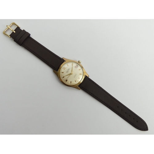 130A - Ramona 25 Jewel date adjust gold plated automatic gents watch on a leather strap, 37.5mm inc. button... 