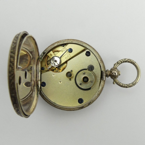 130B - Silver fancy dial open face key wind pocket watch, 39mm x 58mm.
Condition Report: In working order.