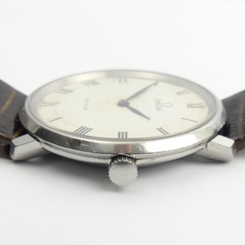 135 - Omega de Ville manual wind gents watch, 34mm wide inc. button.