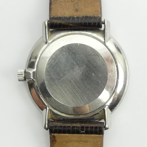 135 - Omega de Ville manual wind gents watch, 34mm wide inc. button.