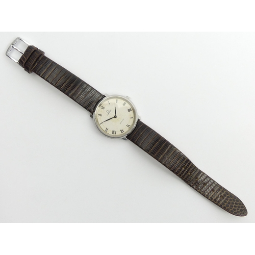 135 - Omega de Ville manual wind gents watch, 34mm wide inc. button.