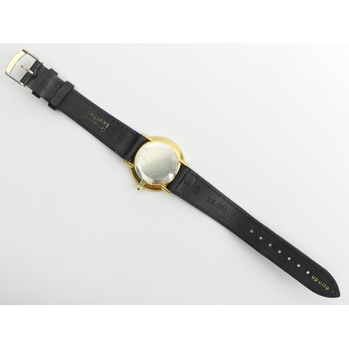 138 - Omega De Ville gold tone manual wind watch on a black leather strap, 35.3mm inc. button.
Condition R... 