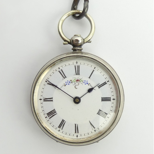 140 - Silver fancy dial pocket watch and a graduated curb link Albert chain, watch 54 x 37mm, chain 19cm.