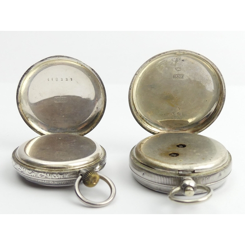 142 - Two fancy dial silver open face pocket watches, largest 54 x 37mm.