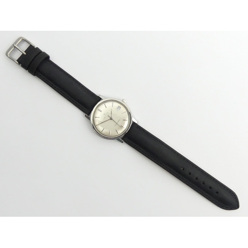 147 - Omega automatic date adjust Seamaster watch on a black leather strap, 36mm inc. Omega button. 
Condi... 