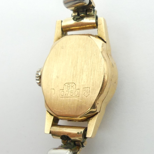 151 - 18ct gold Mudu manual wind watch, 16.5mm wide. 
Condition Report: In good working order.