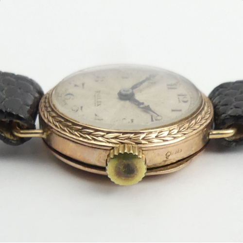 157 - Vintage 9ct gold ladies Prima movement Rolex watch on a Hirsch leather strap, 23.2mm inc. button.
Co... 