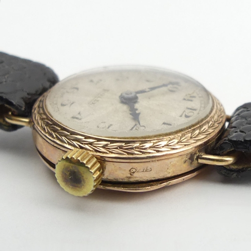 157 - Vintage 9ct gold ladies Prima movement Rolex watch on a Hirsch leather strap, 23.2mm inc. button.
Co... 