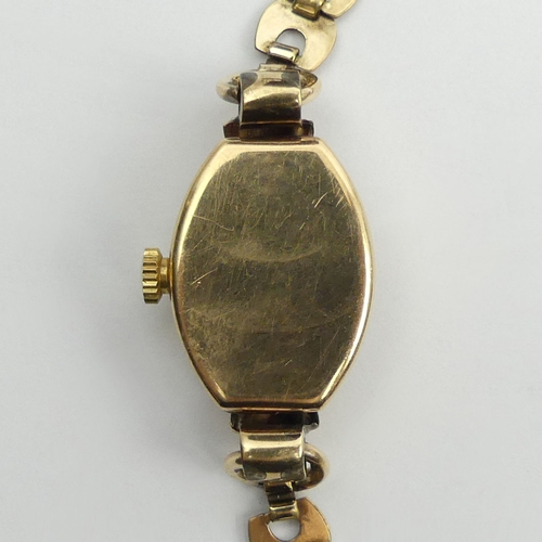 160 - Ladies 1950's Tudor Rolex 9ct gold manual wind watch on a plated strap, with original paperwork, 31m... 