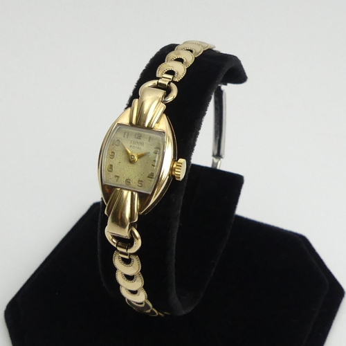 160 - Ladies 1950's Tudor Rolex 9ct gold manual wind watch on a plated strap, with original paperwork, 31m... 