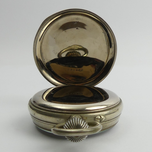 160B - Nickel cased oversize 8 day pocket watch, 13cm x 7cm.
Condition Report: In working order.