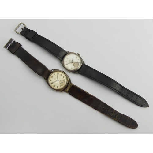 160E - Two Smiths silver wristwatches on leather straps, 31mm wide inc. buttons.