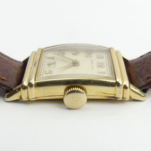 162 - Hamilton manual wind gold plated wristwatch on a leather strap, 23mm x 37mm.
Condition Report: In wo... 