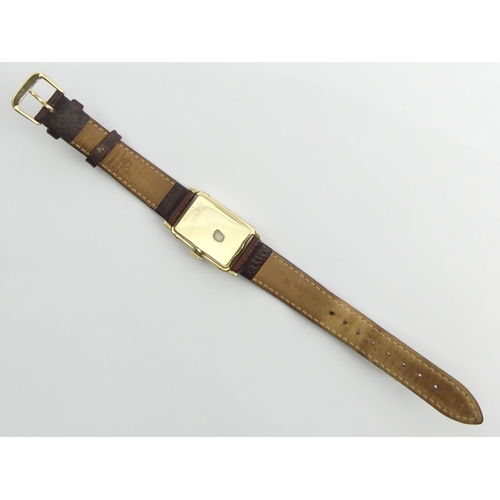 162 - Hamilton manual wind gold plated wristwatch on a leather strap, 23mm x 37mm.
Condition Report: In wo... 