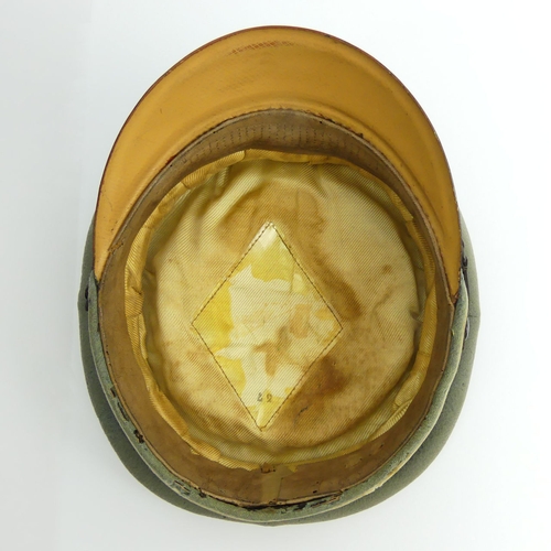 208 - World War II German peak visor cap.