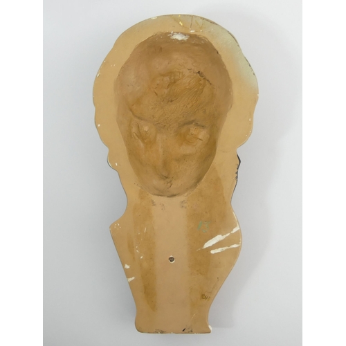 382 - Art Deco plaster wall mask of a lady on the telephone, glass eyes and simulated eye lashes, 39cm.