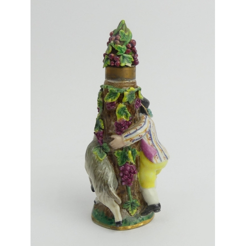 385 - 19th Century Dresden porcelain figural scent bottle and stopper, 8cm.