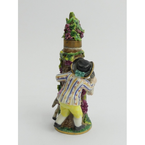 385 - 19th Century Dresden porcelain figural scent bottle and stopper, 8cm.