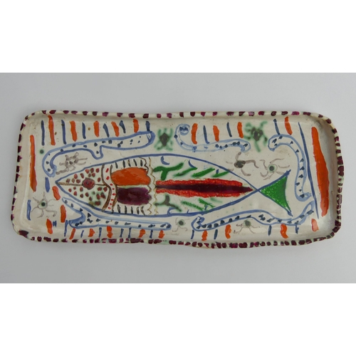 391 - Hand painted oblong pottery dish, fish design, signed J.P. Viii 73, probably John Piper, 29cm x 12cm... 