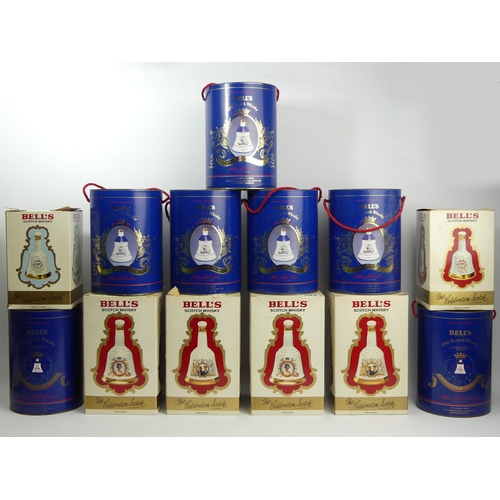 393 - Various Wade boxed and full Royal Commemorative Bells Whisky bottles. (13)