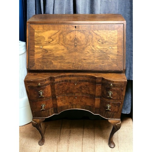 498 - 1950's walnut bureau on cabriole legs, the fall front revealing a fitted interior. 102 x 65cm. Colle... 