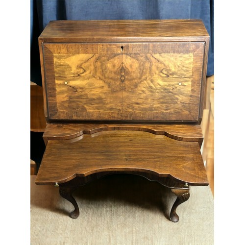 498 - 1950's walnut bureau on cabriole legs, the fall front revealing a fitted interior. 102 x 65cm. Colle... 