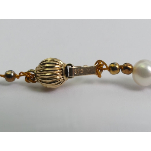 49 - 9ct gold and cultured pearl necklace, 14.8 grams, 46cm x 5.5cm.