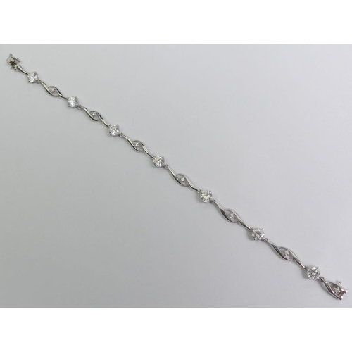 50 - 9ct white gold CZ and diamond bracelet 5.4 grams, 18.5cm x 5.6mm.